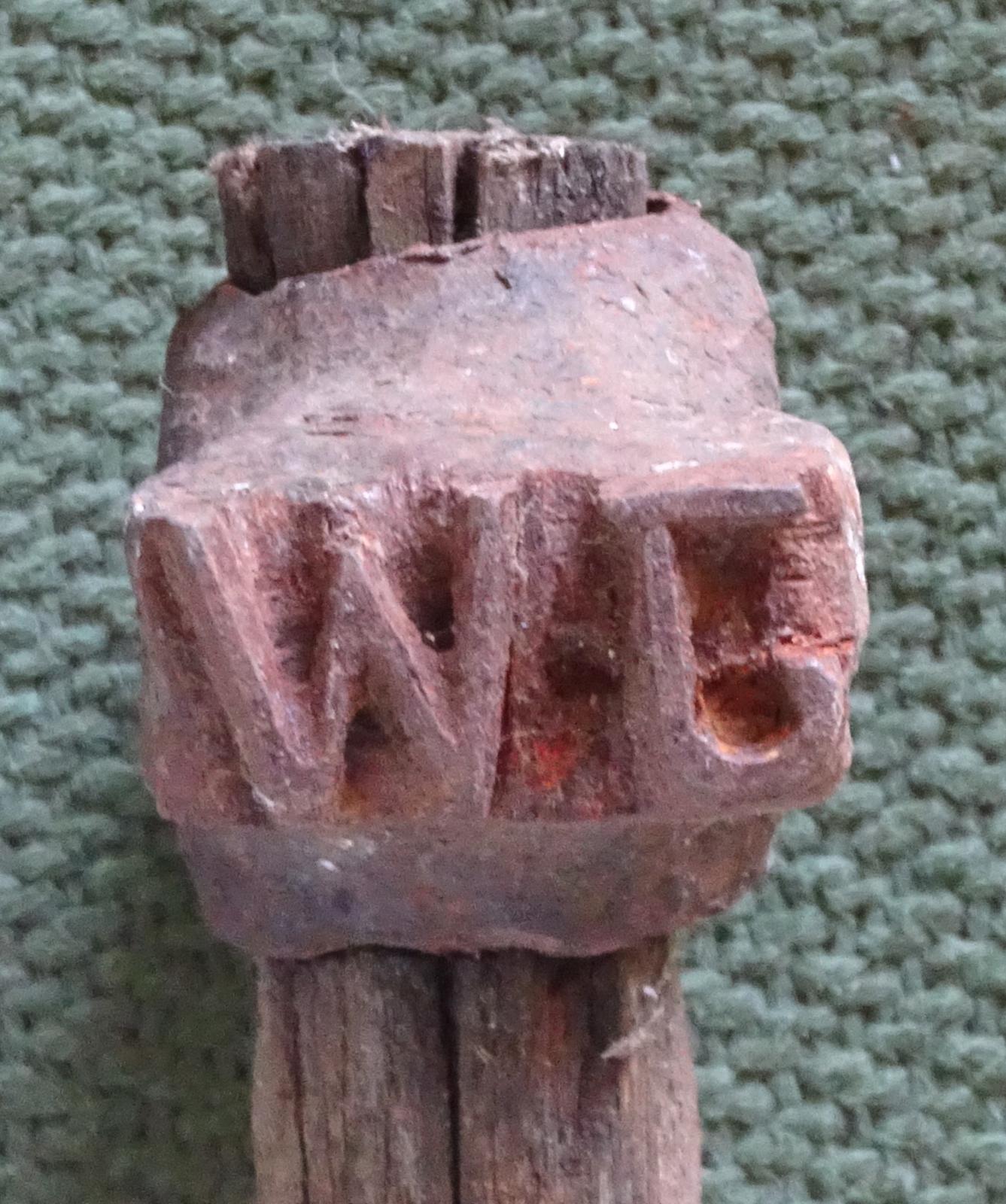 Top of log stamping hammer