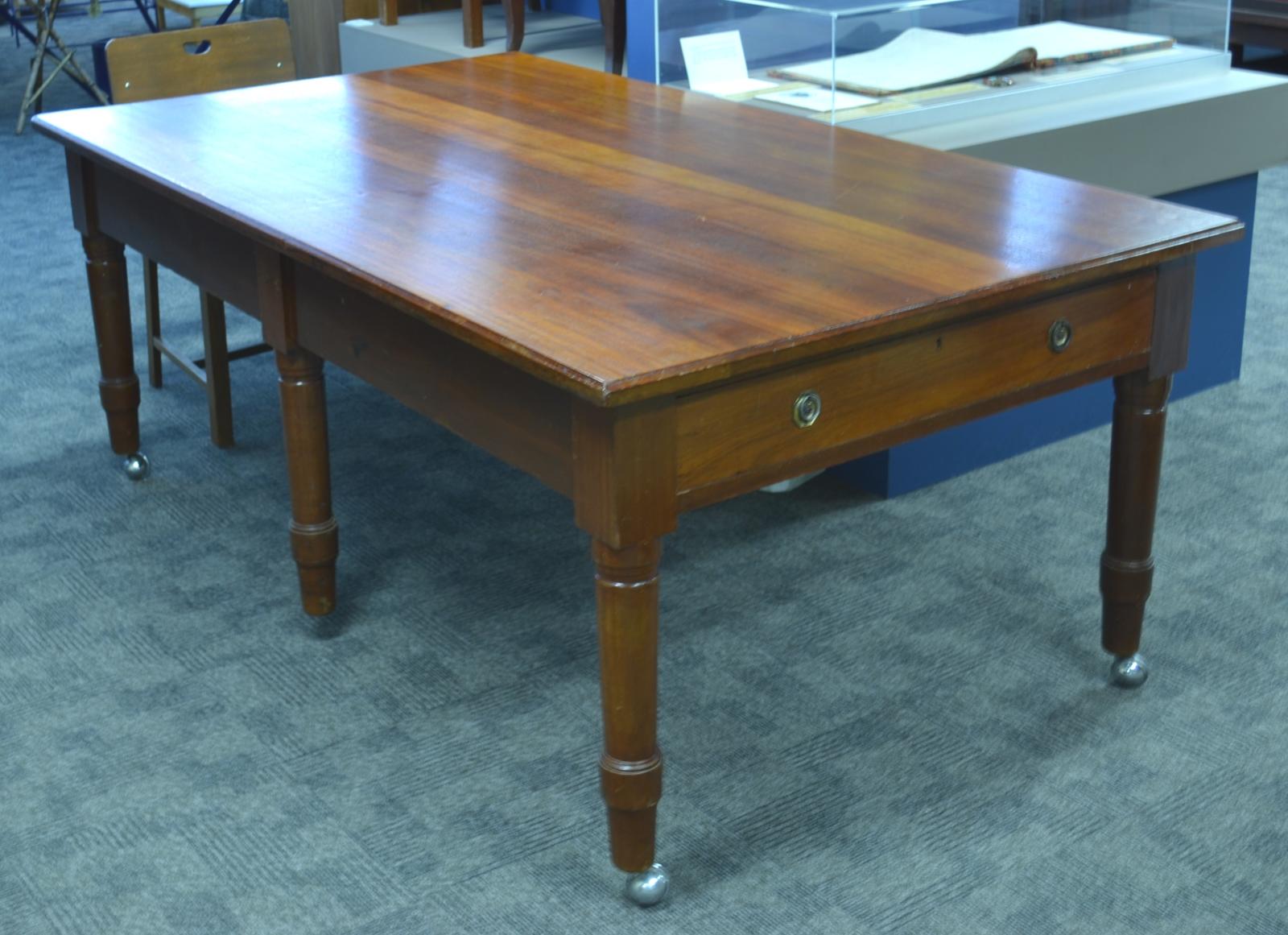 six leg rectangle jarrah table. Draw visible at one end