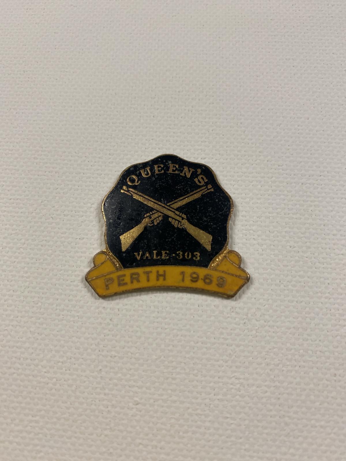 hat badge