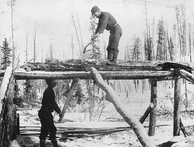 Two men using a pit saw with a trestle possibly in British Columbia c1898.  Image from Library University Washington