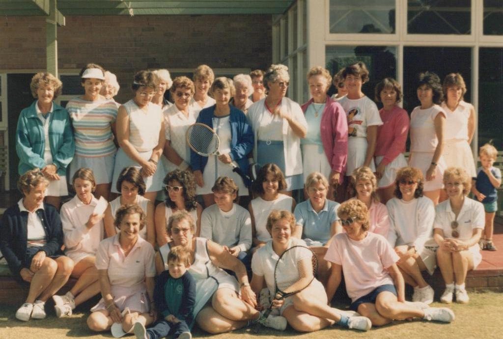 tennis club members posing for a photo