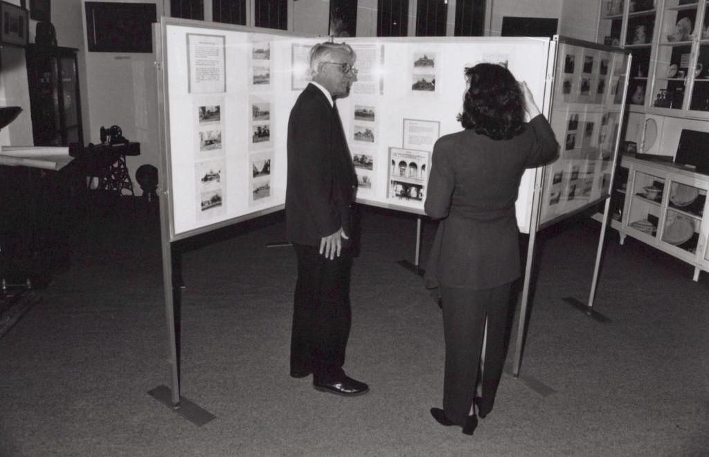 black and white photo of a man and woman standing