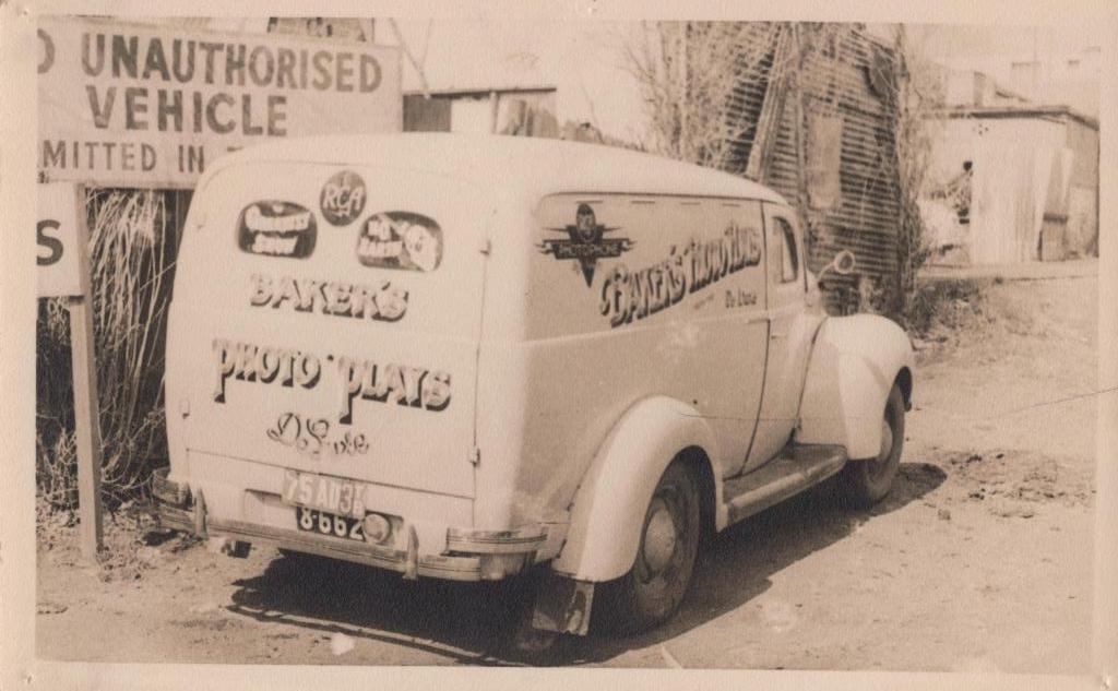 black and white photo of bakery van in the 1930s