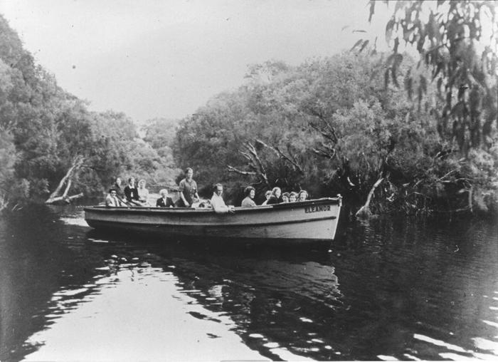 PD00275 Visitors enjoying a boat ride on Loch McNess, Yanchep National Park