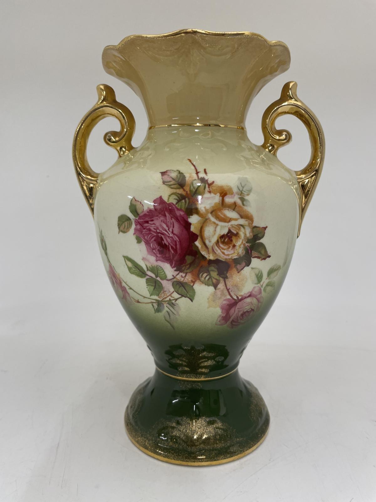 The reverse side of the vase showing a bunch of roses