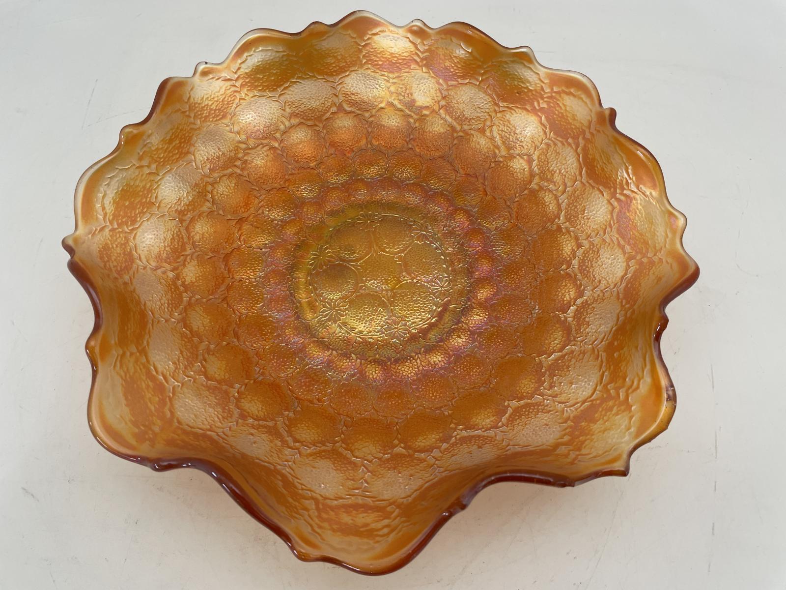 Marigold Carnival Glass Bowl showing the Feather Stitch pattern