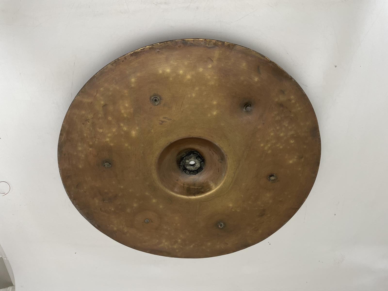 Underside of Ludwig & Ludwig brass cymbal with jingles