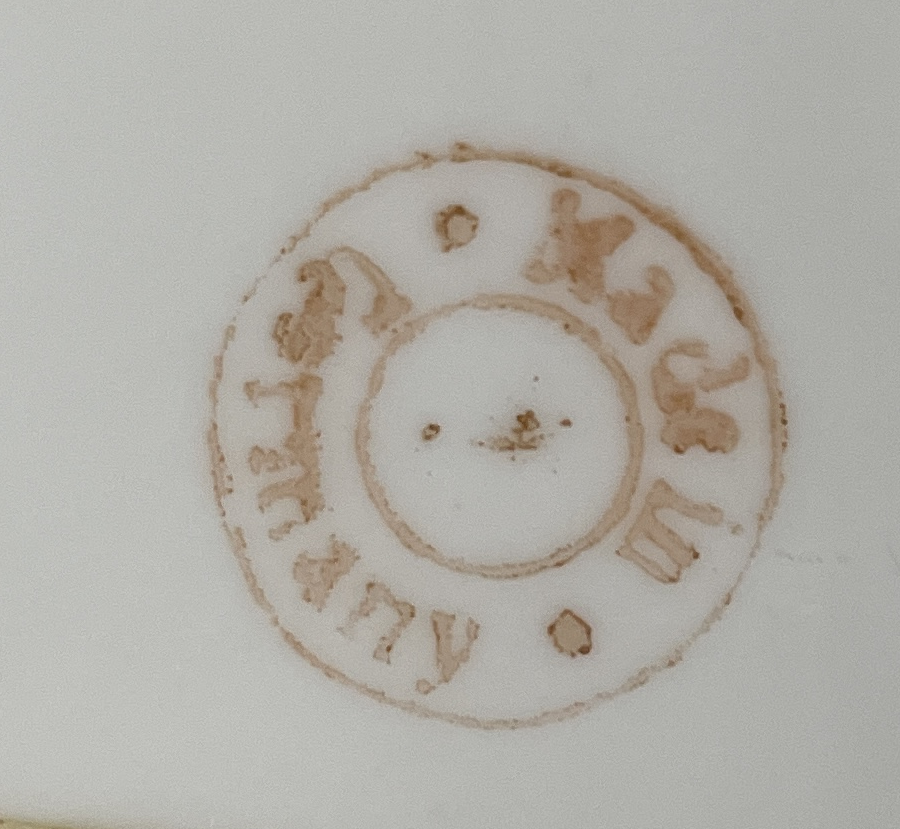 Markings on underside of the plate