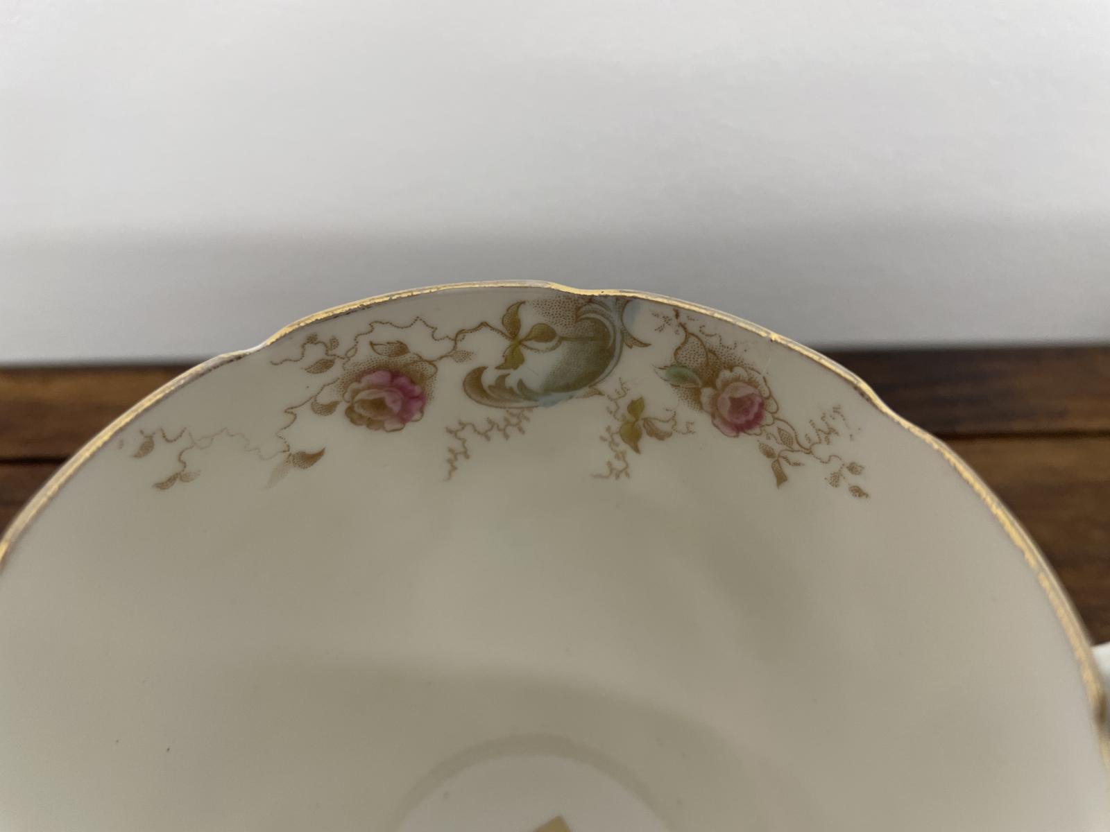 Queen Victoria Diamond Jubilee cup showing the English roses  on the inside of the cup