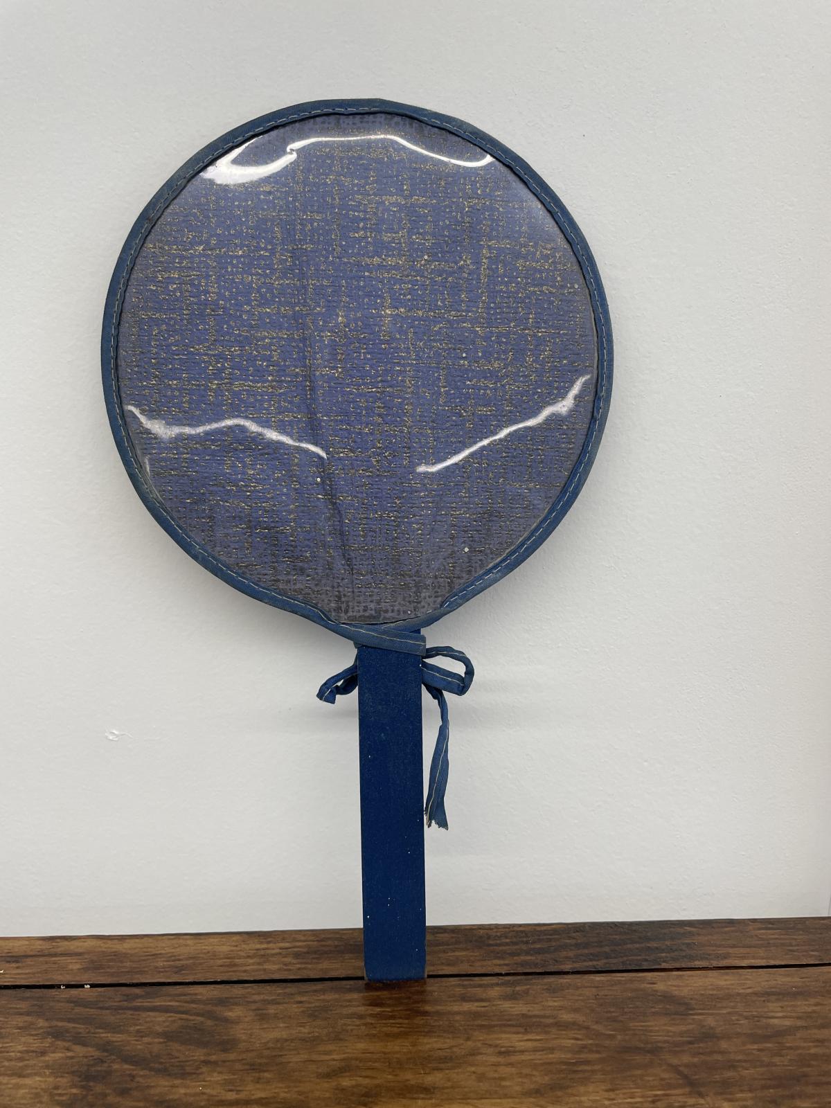 Reverse side of hand fan 
