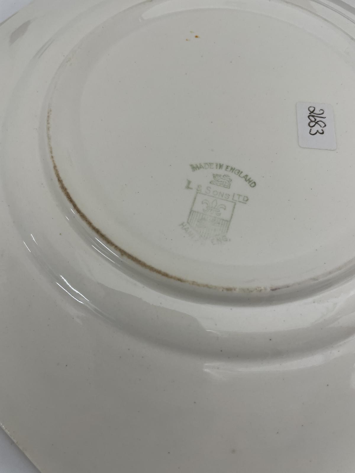 L & Sons mark on base of plate