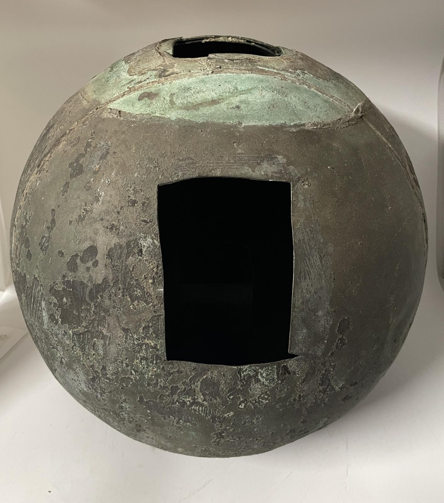 Hollow copper ball that was the mounting for the wind vane on the 1873 Busselton Lighthouse