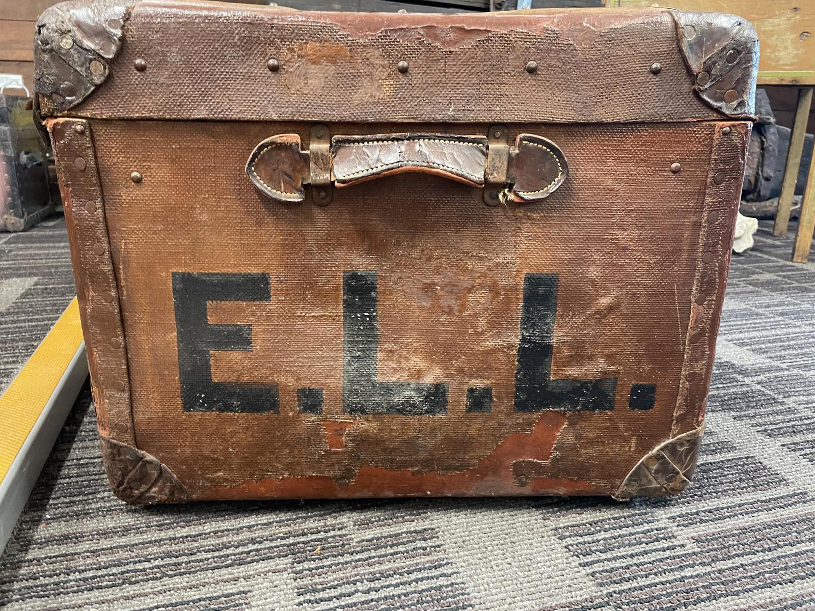 Handle at end of trunk and lettering E.L.L