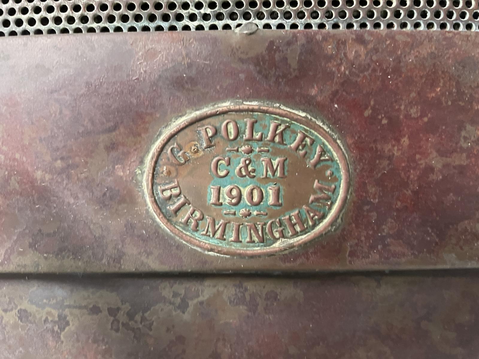 Closeup showing the G Polkey stamp