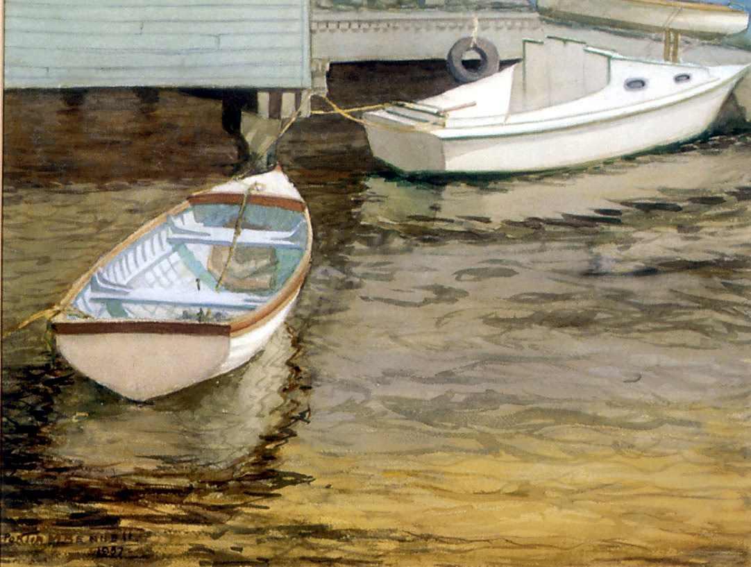 Two dinghies docked on brown coloured water