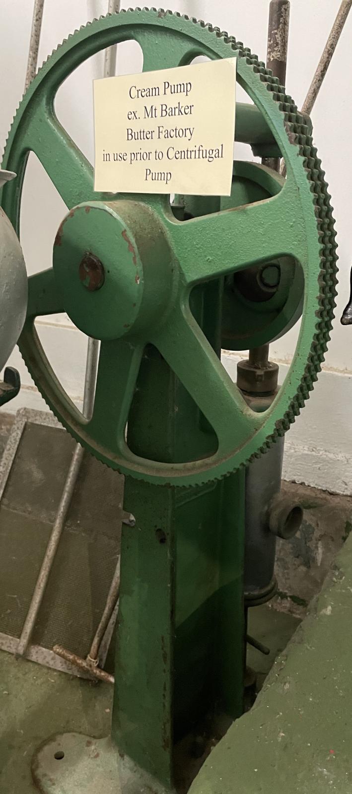 Green painted iron cream pump