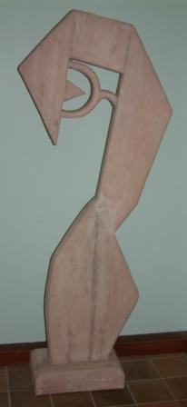 Abstract hook-like sculpture painted pale pink