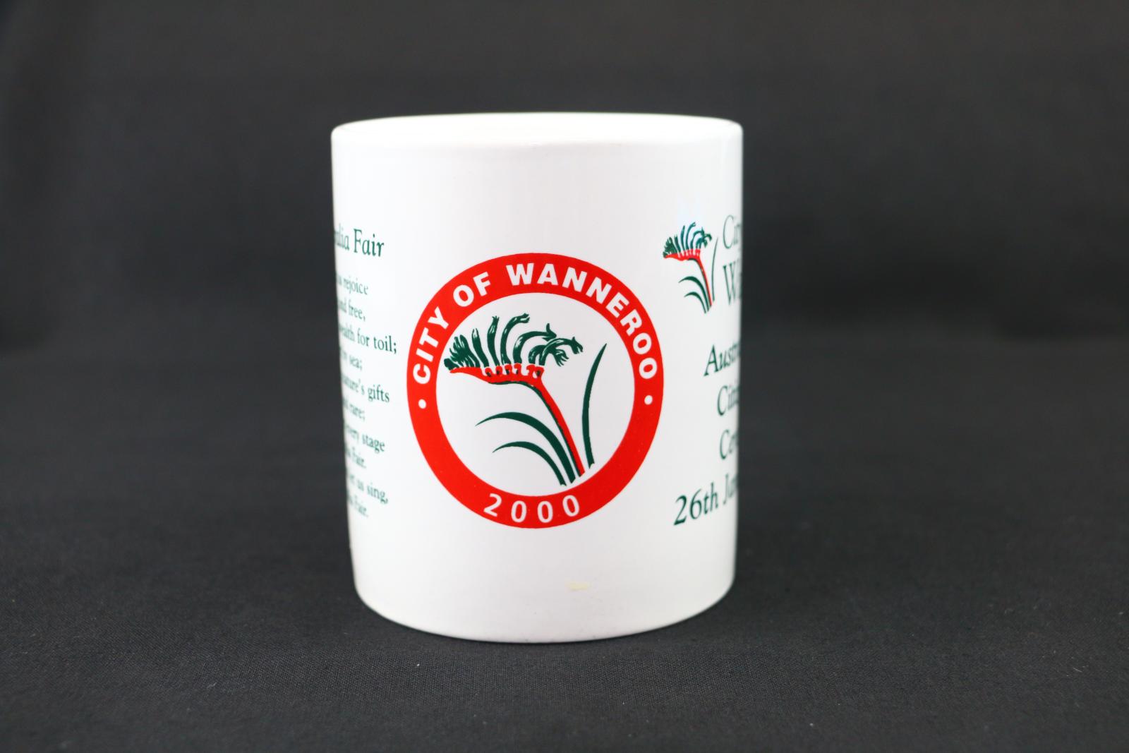 A round, white ceramic, City of Wanneroo, mug. In the middle of the mug is the City of Wanneroo emblem.