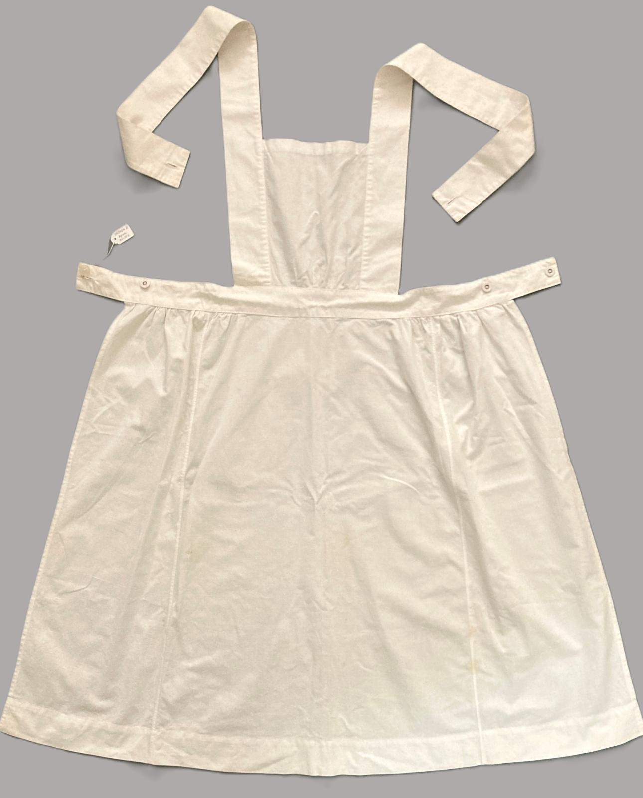 White cotton square bibbed apron.