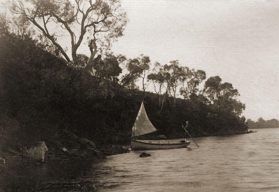 Yacht Being Poled Towards Shore