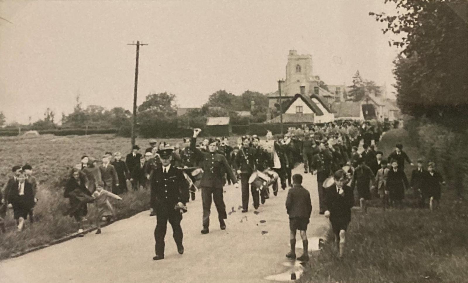 Wings for Victory Week procession through an English village