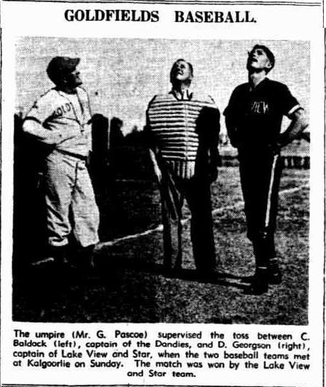 black and white photo of baseball coin toss