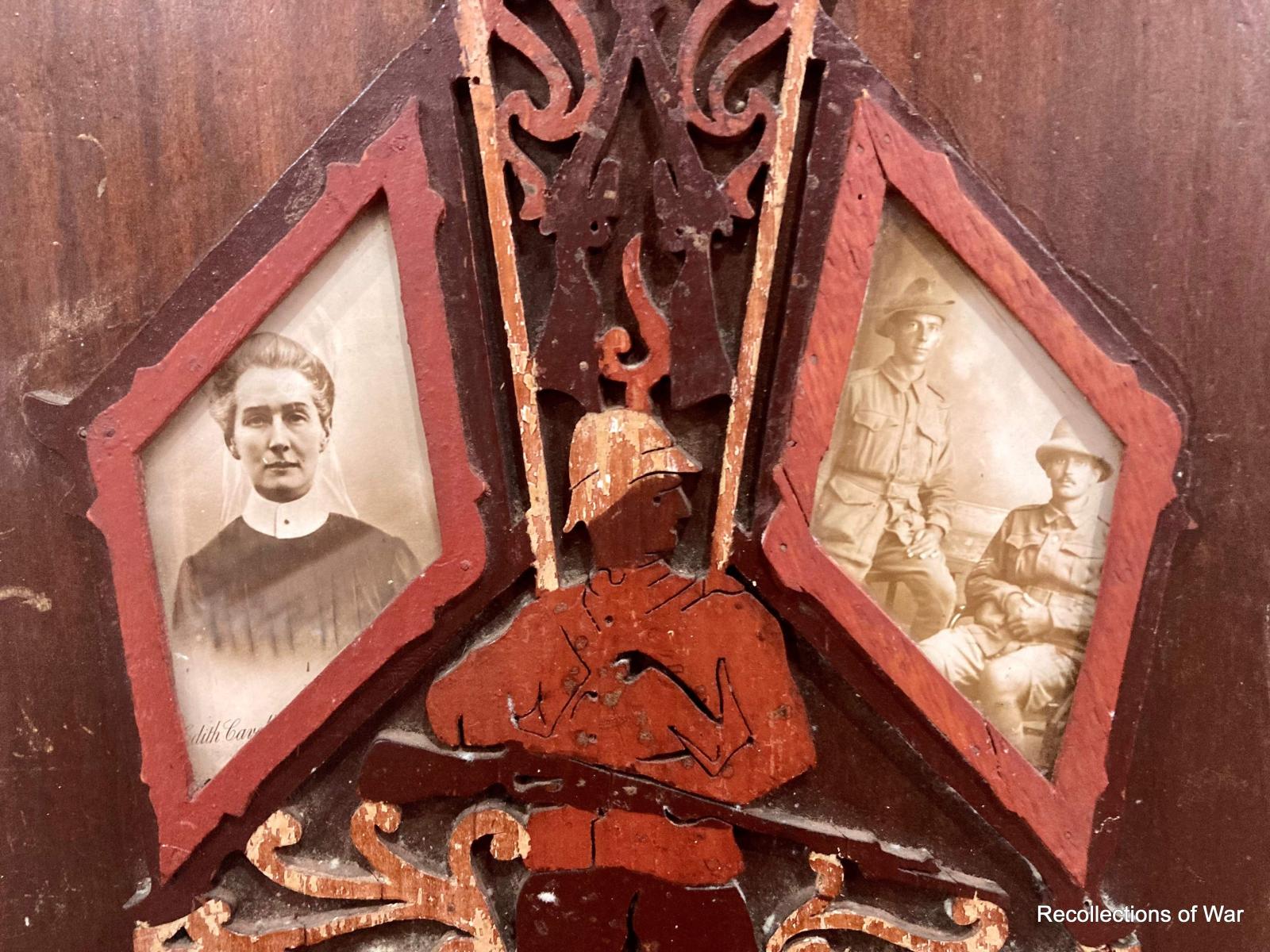 Close-up of timber fretwork memorial featuring British nurse, Edith Cavell, and two soldiers