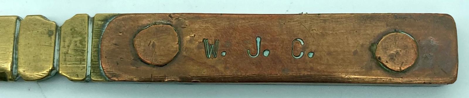 Inscription on letter opener - W.J.C.