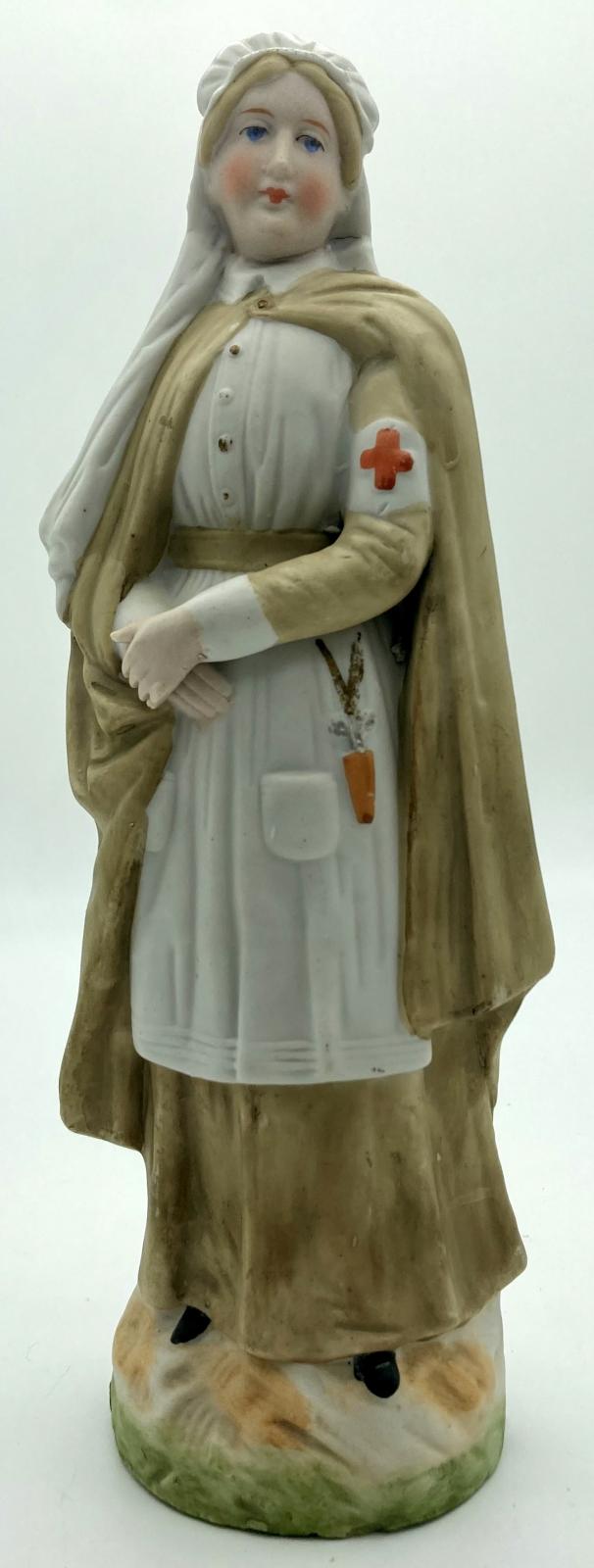 Figurine of Red Cross nurse - front view