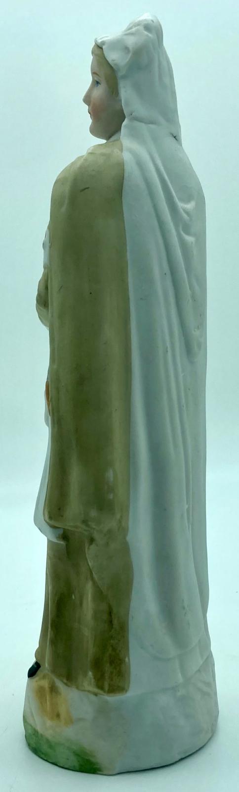 Figure of Red Cross nurse - side view