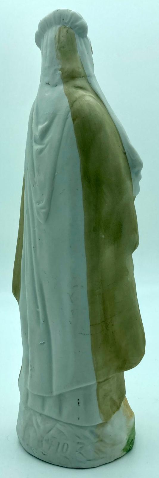 Figure of Red Cross nurse - back view