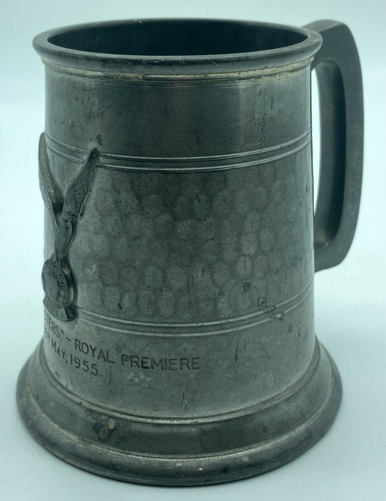 Metal tankard showing handle