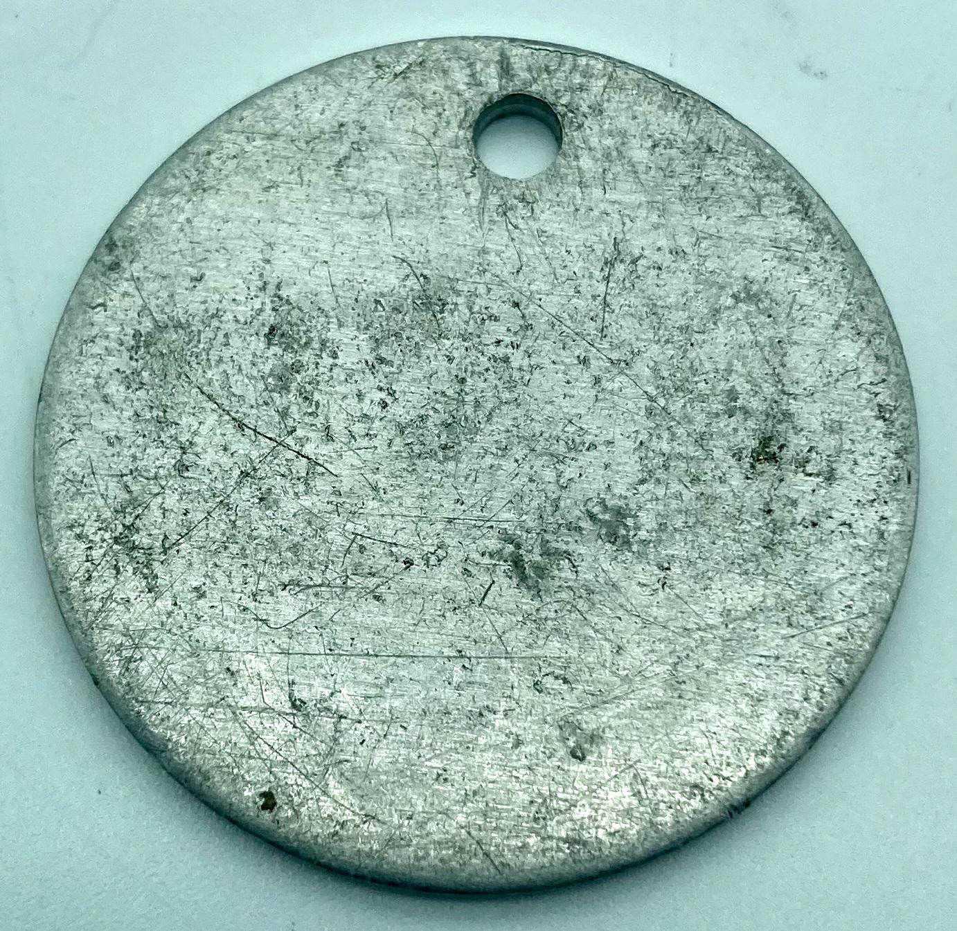 Explosives Factory Maribyrnong (E.F.M.) metal disc - reverse