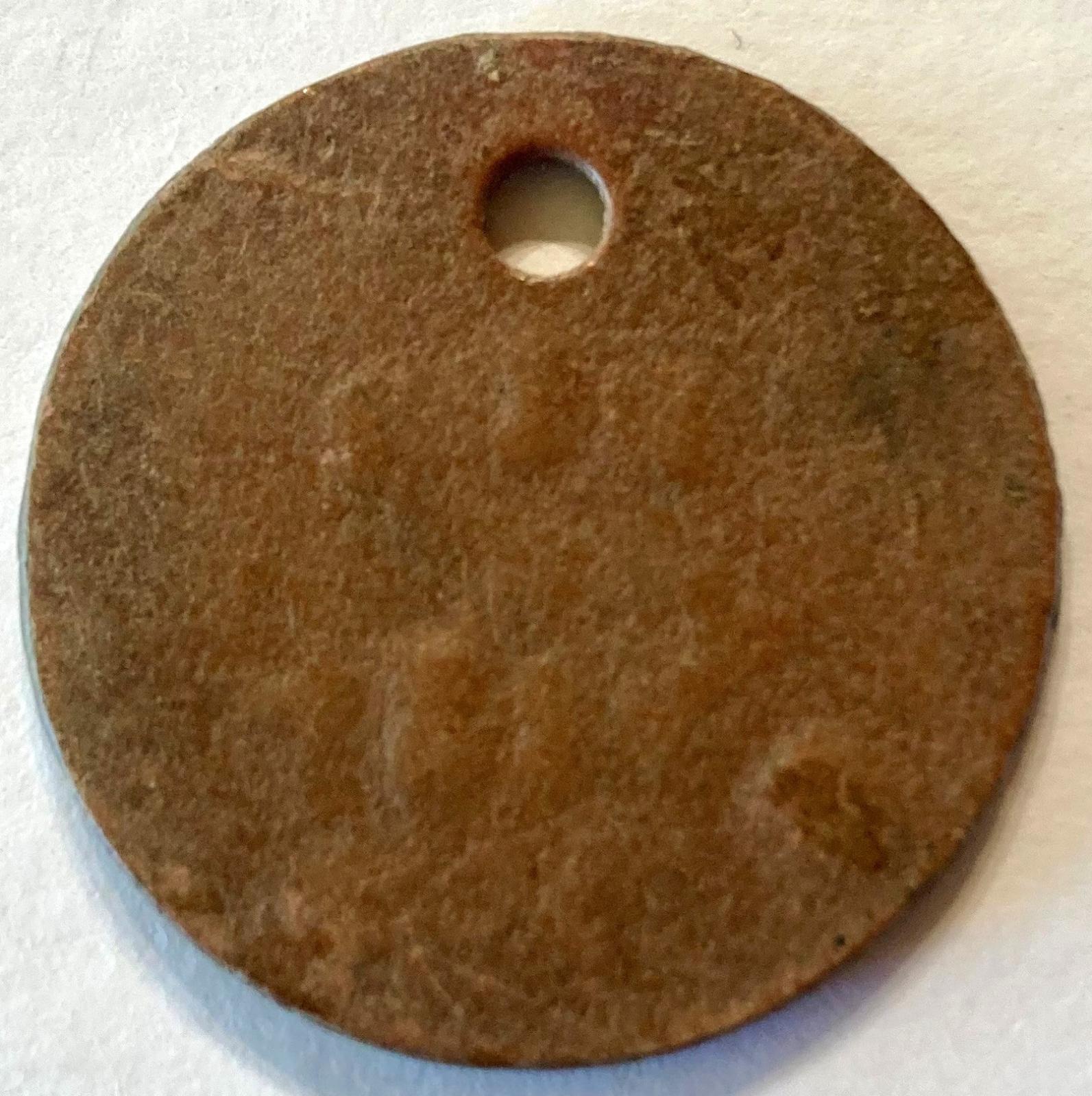 Reverse of WWI identity disc - John McLeod Reid