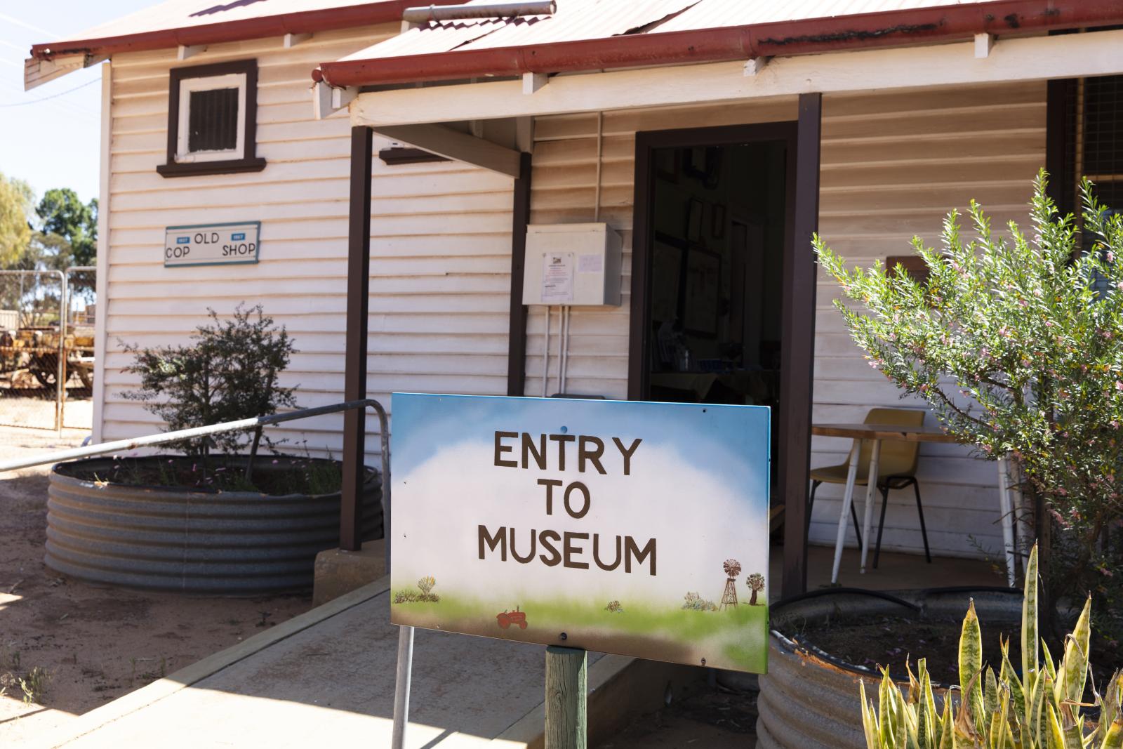 Morawa Museum's Old Police Station building with sign out the front saying 'ENTRY TO MUSEUM'