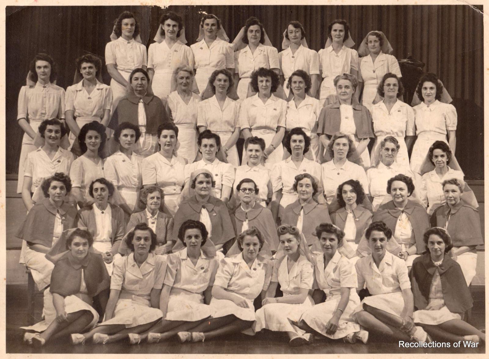 Photograph of staff of Cheer-Up Society Hut, 1947