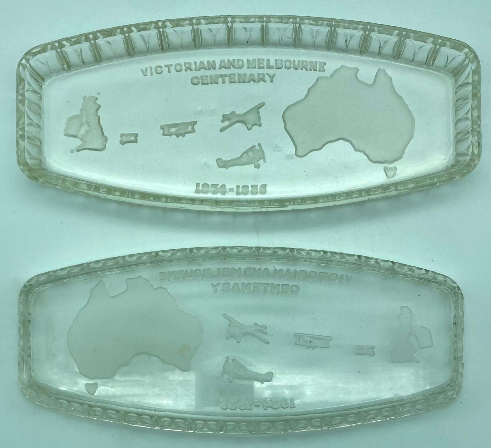 Two glass trays showing front and back