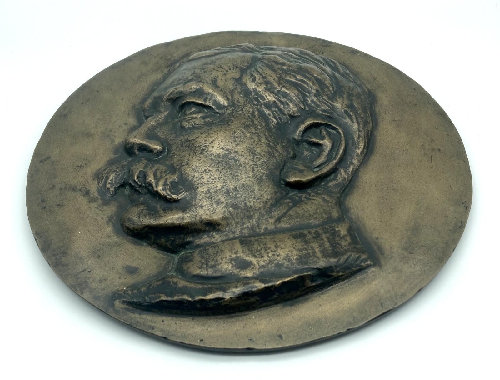 Circular bronze bas relief plaque of Lord Kitchener  - oblique view