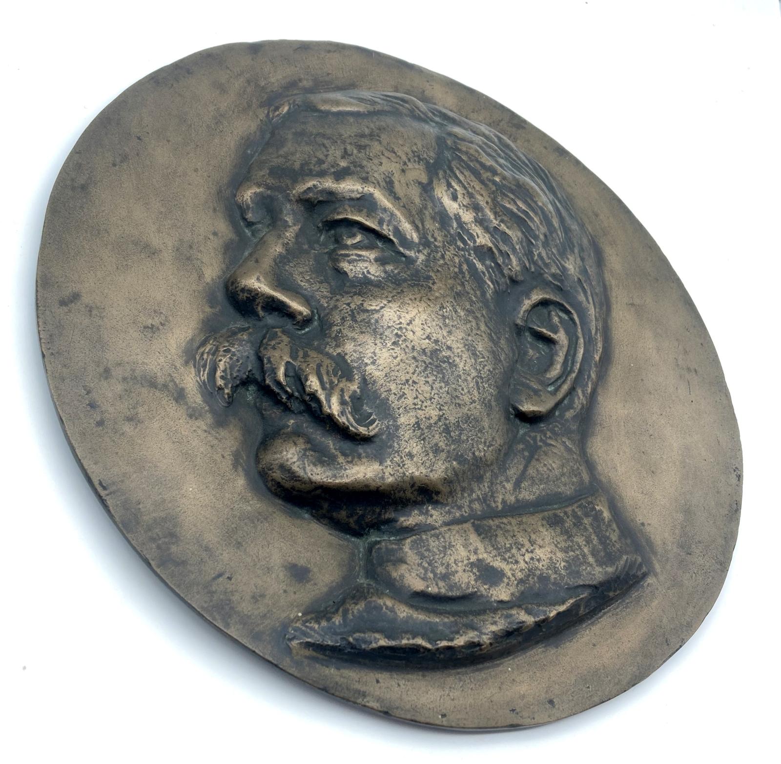 Circular bronze bas relief plaque of Lord Kitchener  - side view