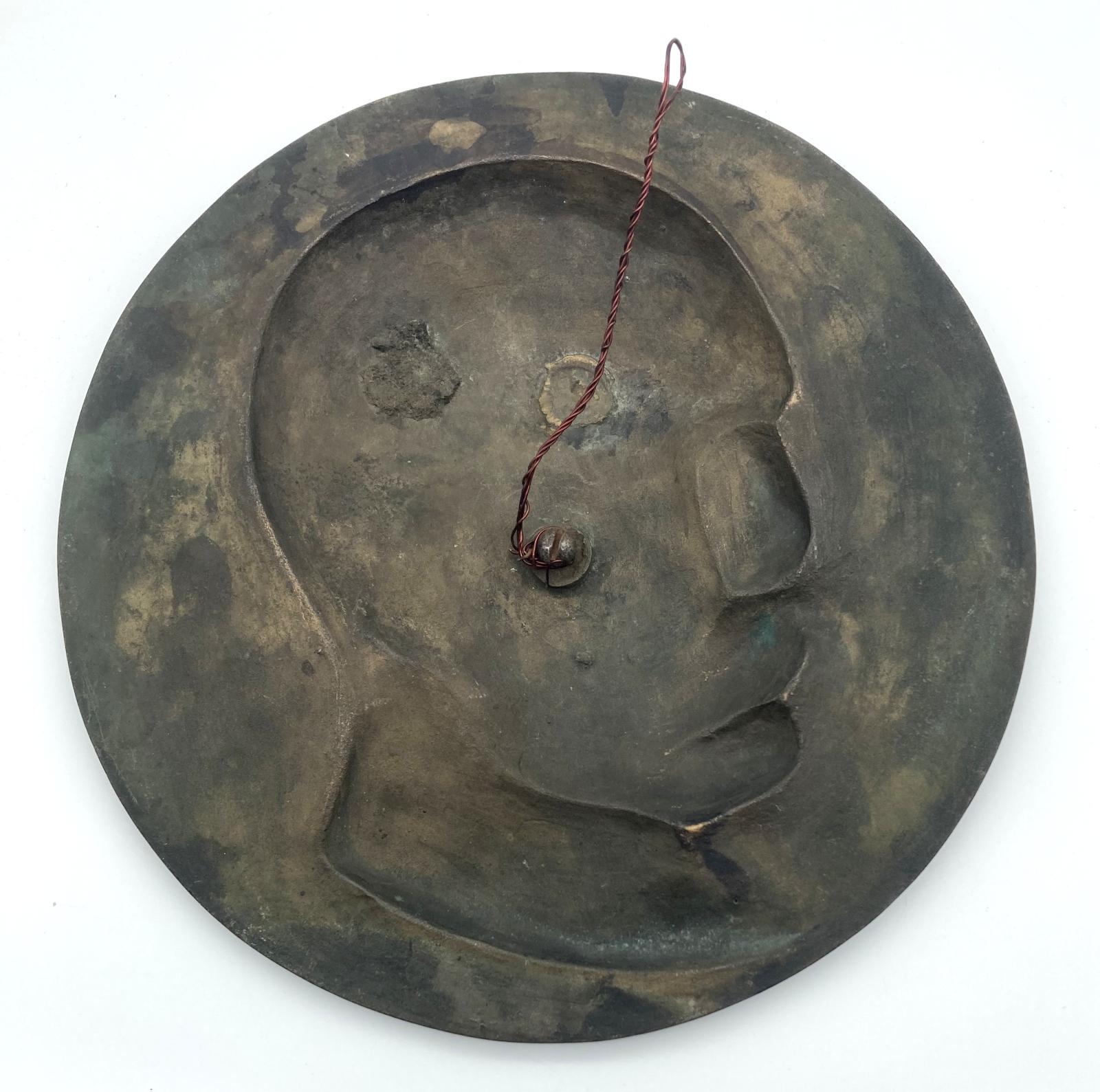 Circular bronze bas relief plaque of Lord Kitchener  - back view