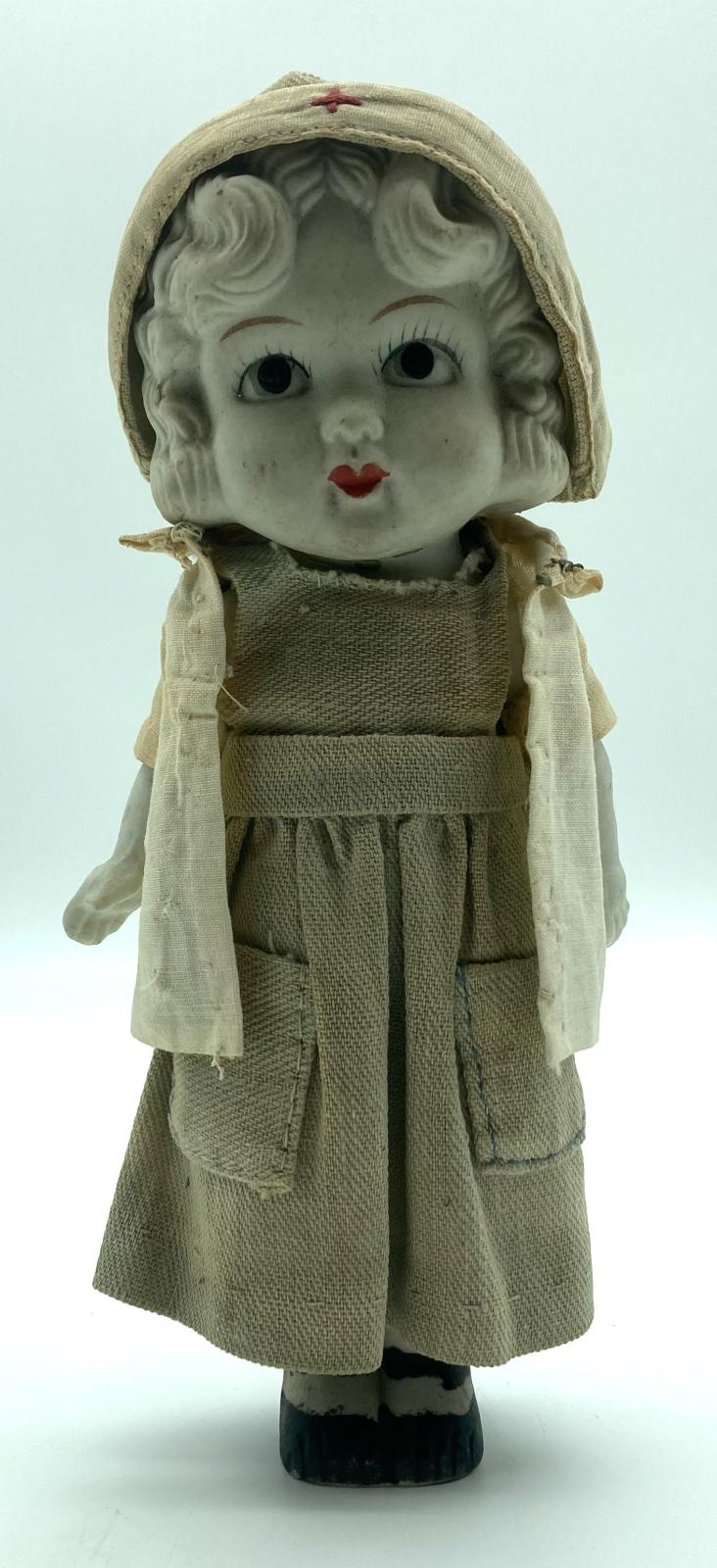 Antique bisque Red Cross doll - front view