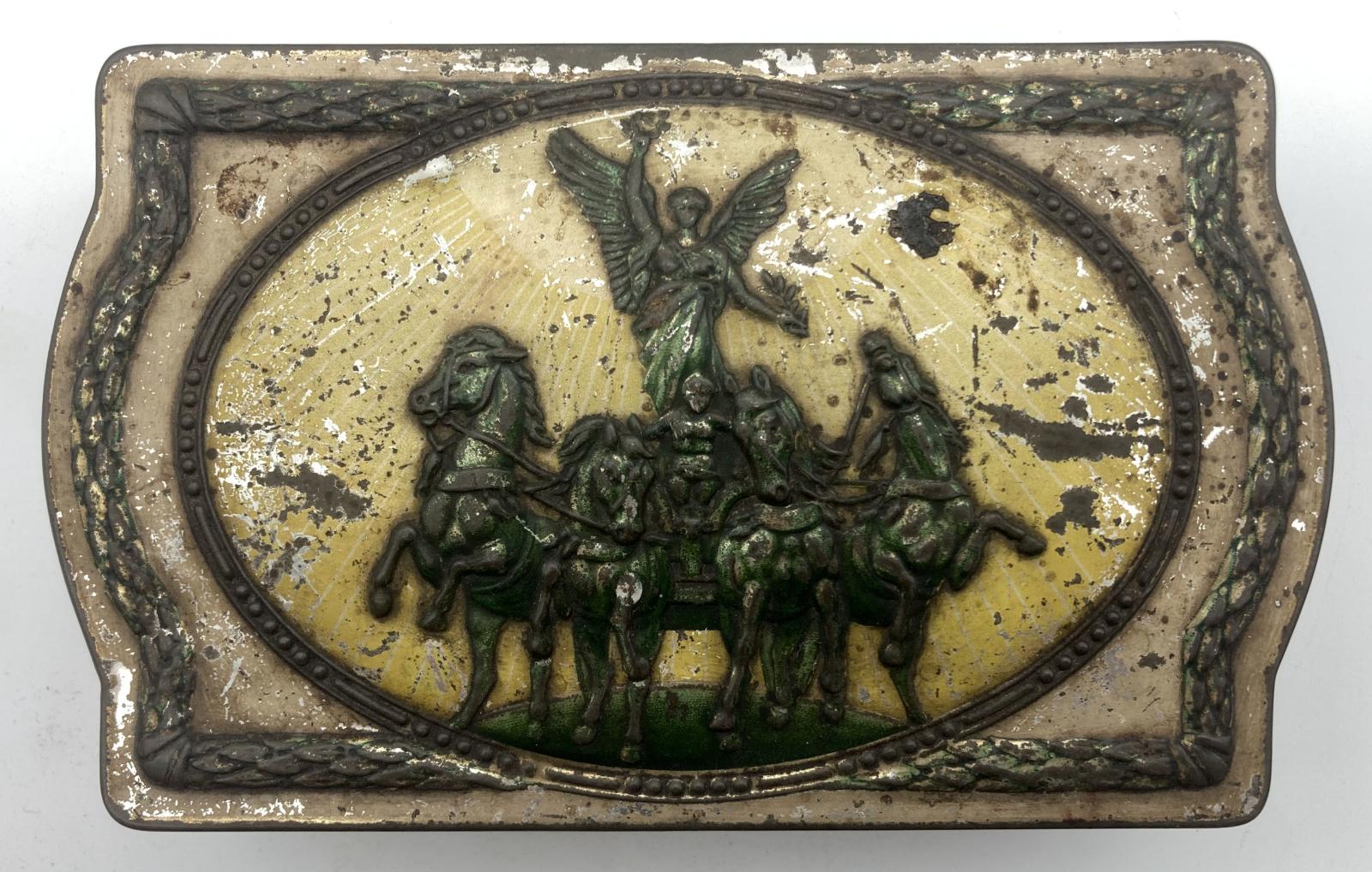 Top view of tin showing the Quadriga sculpture