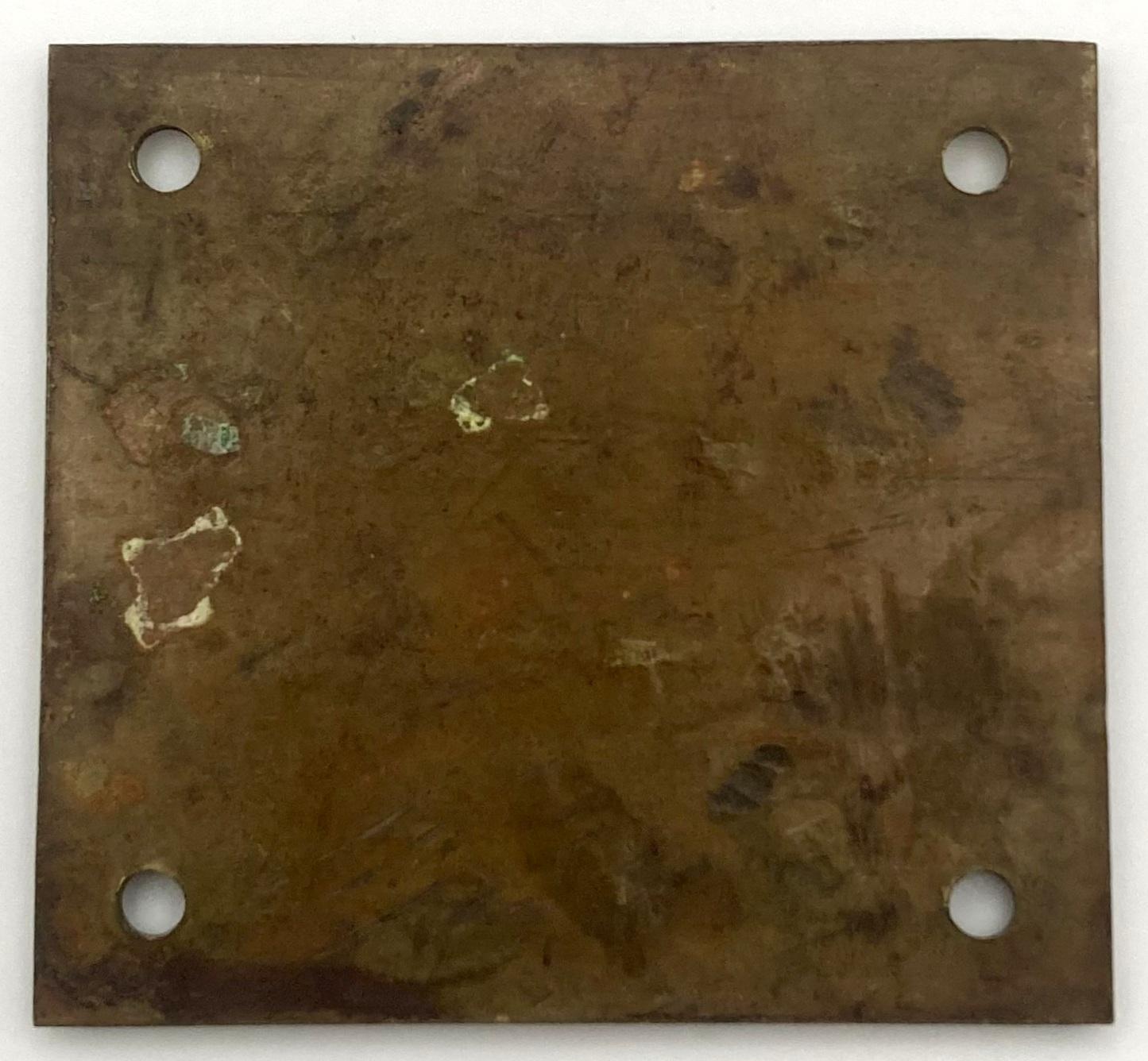 Reverse of square metal identification label - K.N. Leek