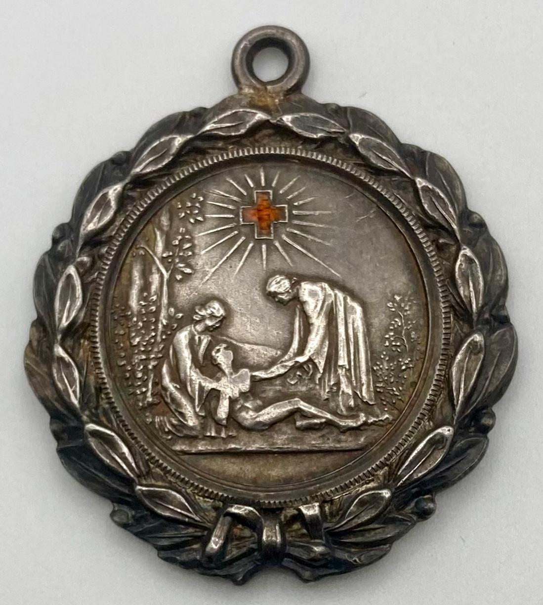 Front of B.R.C.S. medallion - Catherine M. Topham, 1913