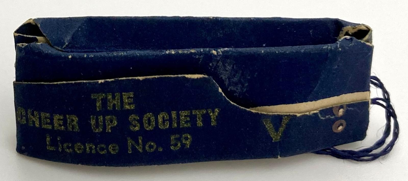 Cheer-Up Society fundraising pin in shape of R.A.A.F. sidecap showing maker's details