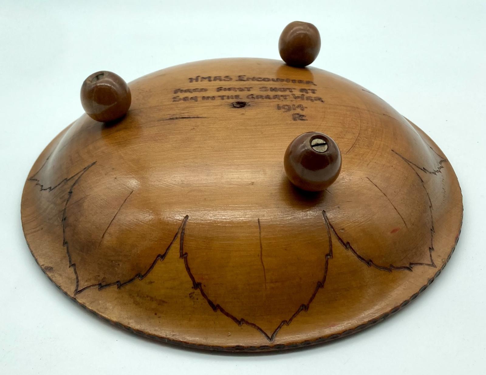 Pokerwork bowl made of timber from the H.M.A.S. Encounter  - showing feet