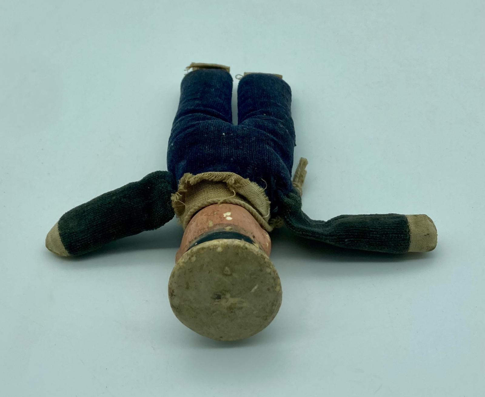 Top view of WWI era sailor doll