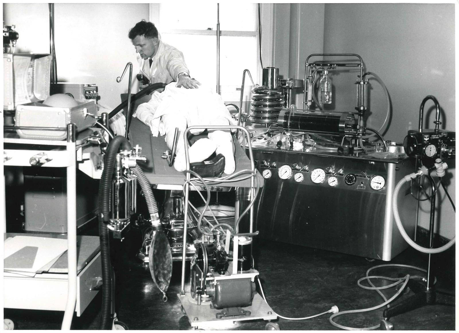 RPH heart lung machine with Melrose disc oxygenator (black horizontal cylinder in the middle of machine on the right) 1963