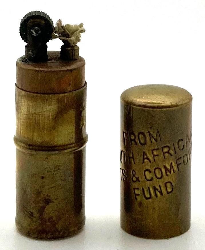 South African Gifts and Comforts Fund cigarette lighter showing mechanism