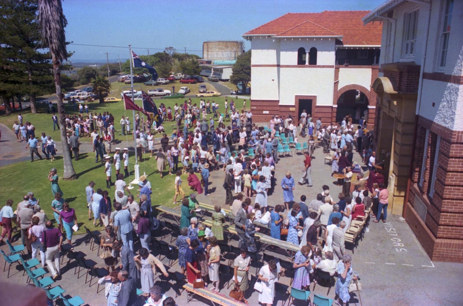 The crow dispersing after the flag raising ceremony